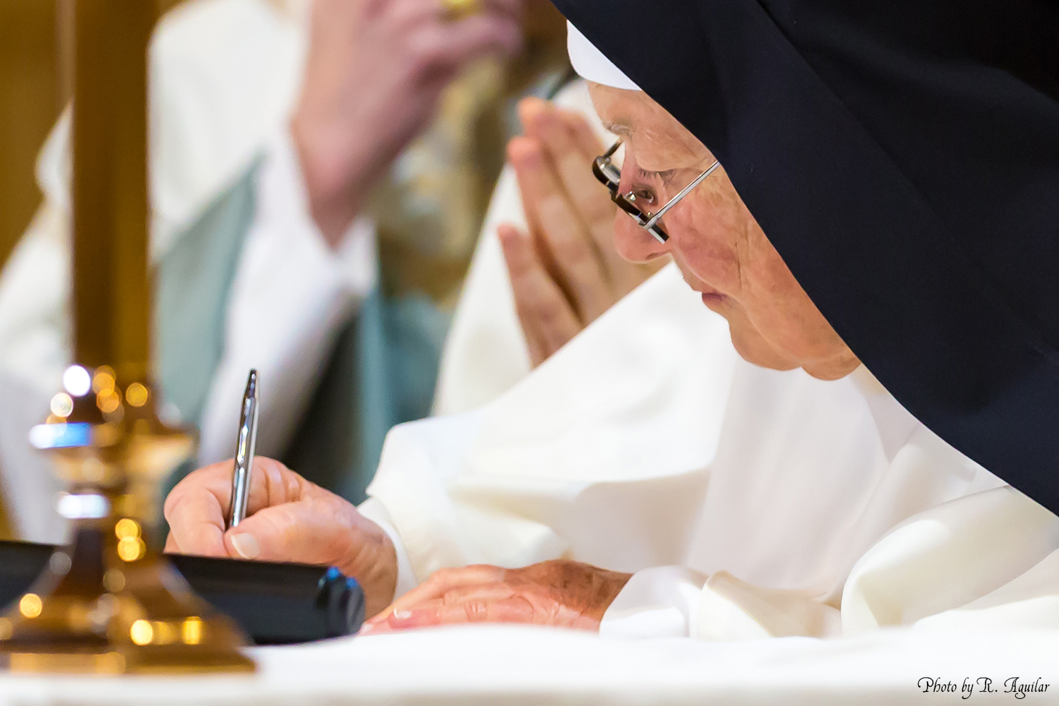 22 Prioress signing the formula of profession